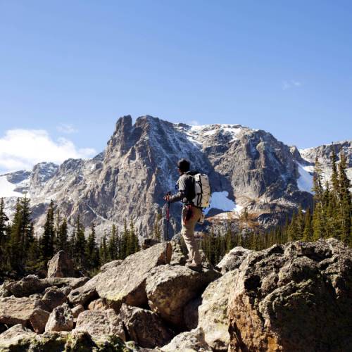 Majestic Mountain Peak: Snow-capped Summit and Rugged Trail -  Canada